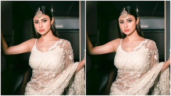 Mouni played muse to fashion designer house Premya and picked a sheer white saree from the shelves of the designer house.&nbsp;(Instagram/@imouniroy)