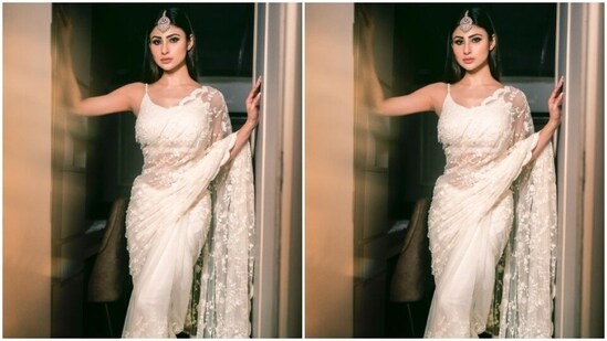 Mouni further accessorised her look for the day in an oxidised golden maang tikka with pastel green embellishments from the house of Golecha’s Jewels.&nbsp;(Instagram/@imouniroy)