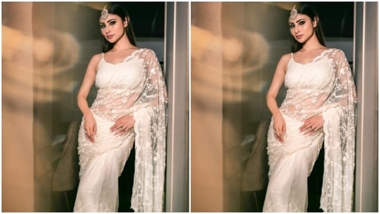Styled by fashion stylist Rishika Devnani, Mouni wore her tresses open in straight locks as she posed for the pictures.&nbsp;(Instagram/@imouniroy)