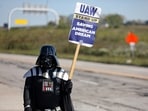 United Auto Workers Local 12 member Michael Gatto wears a Darth Vader costume as he pickets during the ongoing UAW strike at the Stellantis Toledo Assembly Complex on Monday, Oct. 2, 2023.