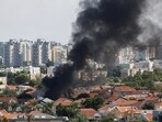 Smoke rises in the aftermath of rocket barrages that were launched from Gaza, in Ashkelon, Israel. (Reuters)