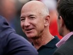 FILE - Amazon founder Jeff Bezos is seen on the sidelines before the start of an NFL football game, Sept. 15, 2022, in Kansas City, Mo. The founder of Amazon is buying a home on an exclusive barrier island in Miami where he'll be neighbors with Tom Brady, Ivanka Trump and her husband, Jared Kushner. (AP Photo/Charlie Riedel, File) FILE - Amazon founder Jeff Bezos is seen on the sidelines before the start of an NFL football game, Sept. 15, 2022, in Kansas City, Mo. The founder of Amazon is buying a home on an exclusive barrier island in Miami where he'll be neighbors with Tom Brady, Ivanka Trump and her husband, Jared Kushner. (AP Photo/Charlie Riedel, File)