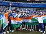 Indian players celebrate after winning the Men's Gold Medal cricket match against Afghanistan at the 19th Asian Games, in Hangzhou Indian players celebrate after winning the Men's Gold Medal cricket match against Afghanistan at the 19th Asian Games, in Hangzhou