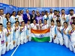 Indian men's kabaddi team and women's kabaddi team pose for photos at the 19th Asian Games in Hangzhou
