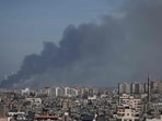 Israel-Palestine Latest: Smoke billows over the Israeli side of the border with Gaza as seen from Gaza City. Israel-Palestine Latest: Smoke billows over the Israeli side of the border with Gaza as seen from Gaza City.