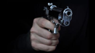 Around 4am, the man woke up to vigorous knocking on the window. As he looked outside, he was shocked to see a man pointing a gun at him. (Getty Images/iStockphoto)