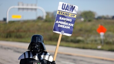 United Auto Workers Local 12 member Michael Gatto wears a Darth Vader costume as he pickets during the ongoing UAW strike at the Stellantis Toledo Assembly Complex on Monday, Oct. 2, 2023. (AP) United Auto Workers Local 12 member Michael Gatto wears a Darth Vader costume as he pickets during the ongoing UAW strike at the Stellantis Toledo Assembly Complex on Monday, Oct. 2, 2023. (AP)