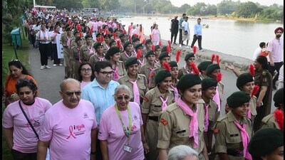 Besides breast cancer survivors and senior doctors, students from various schools and National Service Scheme volunteers and National Cadet Corps cadets also took part in the walkathon. (Ravi Kumar/HT)