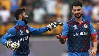 Naveen-ul-Haq and Ikram Alikhil celebrate after the dismissal of Mehidy Hasan Miraz during the 2023 ICC Men's Cricket World Cup (AFP) Naveen-ul-Haq and Ikram Alikhil celebrate after the dismissal of Mehidy Hasan Miraz during the 2023 ICC Men's Cricket World Cup (AFP)