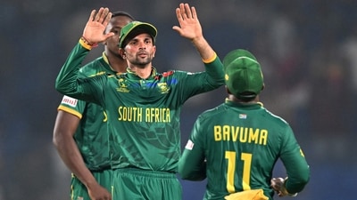 South Africa's Keshav Maharaj (C) celebrates with his team captain Temba Bavuma after their victory (AFP) South Africa's Keshav Maharaj (C) celebrates with his team captain Temba Bavuma after their victory (AFP)