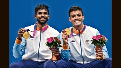 Gold medallists Satwiksairaj Rankireddy (L) and Chirag Shetty in Hangzhou on Saturday. (AFP) Gold medallists Satwiksairaj Rankireddy (L) and Chirag Shetty in Hangzhou on Saturday. (AFP)