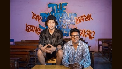 Sushant Yattam, (right) co-founder of The Dharavi Dream Project, with chief mentor MC Heam, at the After School of Hip-Hop, in Dharavi. (Satish Bate/ HT PHOTO) Sushant Yattam, (right) co-founder of The Dharavi Dream Project, with chief mentor MC Heam, at the After School of Hip-Hop, in Dharavi. (Satish Bate/ HT PHOTO)