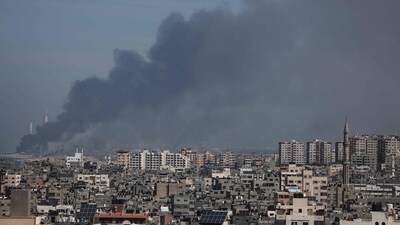 Israel-Palestine Latest: Smoke billows over the Israeli side of the border with Gaza as seen from Gaza City. (AFP) Israel-Palestine Latest: Smoke billows over the Israeli side of the border with Gaza as seen from Gaza City. (AFP)