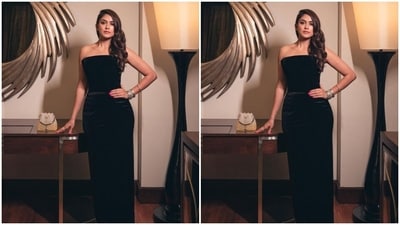 Mrunal looked stunning as ever in the off-shoulder black velvet gown. The gown cascaded to bodycon patterns to her ankles as it hugged her shape and showed off her curves perfectly.&nbsp; (Instagram/@mrunalthakur)