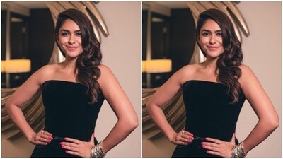 Styled by fashion stylist Sheefa J Gilani, Mrunal wore her tresses open in wavy curls with a side part and decked up in nude eyeshadow, black eyeliner, black kohl, mascara-laden eyelashes, feathered eyebrows, contoured cheeks and a shade of nude lipstick.&nbsp; (Instagram/@mrunalthakur)