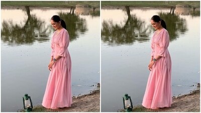 Mrunal aced the perfect evening look in a pastel pink flowy gown with frill details. In a sleek neck chain and minimal earrings, Mrunal looked perfect.&nbsp; (Instagram/@mrunalthakur)