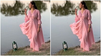 Mrunal's fashion diaries are getting better by the day. The actor looked stunning in a pink gown as she chased a sunset, a few days back.&nbsp; (Instagram/@mrunalthakur)