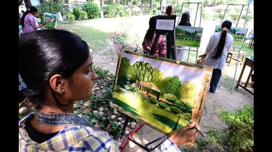 Participants during the painting competition on the first day of PU Zonal Youth and Heritage Festival at MCM DAV College in Sector 36, Chandigarh, on, Saturday. (Ravi Kumar/HT)
