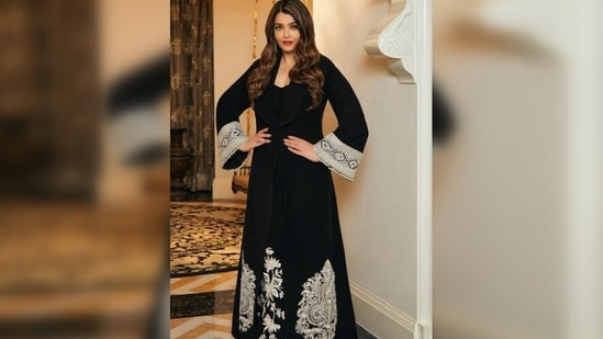 Aishwarya Rai Bachchan's attire features intricate white embroidery on both the jacket and the dress, adding to its overall elegance.&nbsp;(Instagram/@manishmalhotra05)