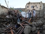 Afghans stand among destruction after an earthquake in Gayan village, in Paktika province, Afghanistan. (AP/File) Afghans stand among destruction after an earthquake in Gayan village, in Paktika province, Afghanistan. (AP/File)