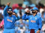 Rohit Sharma (L) and Virat Kohli gesture during the 2023 ICC Men's Cricket World Cup one-day international (ODI) match between India and Australia. Rohit Sharma (L) and Virat Kohli gesture during the 2023 ICC Men's Cricket World Cup one-day international (ODI) match between India and Australia.