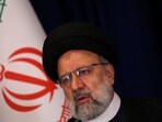 Israel-Palestine Conflict: Iranian President Ebrahim Raisi looks on during a press conference.