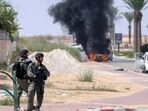 Israel-Palestine Conflict: Israeli soldiers take position at the southern Israeli town of Ofakim.