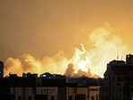 Israel-Palestine Conflict: Smoke rises above buildings in Gaza City during an Israeli air strike.
