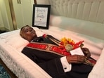 James Murphy, a man who was accidentally mummified and known publicly by the name "Stoneman Willie", lies on display at a local funeral home in Reading, Pennsylvania.
