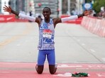 Kenya's Kelvin Kiptum celebrates winning the 2023 Bank of America Chicago Marathon in Chicago, Illinois, in a world record time of two hours and 35 seconds on October 8, 2023.