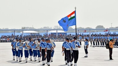 Indian Air Force (IAF) personnel march past while holding the new IAF ensign. (ANI) Indian Air Force (IAF) personnel march past while holding the new IAF ensign. (ANI)
