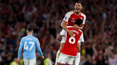 Arsenal's French defender #02 William Saliba and Arsenal's Brazilian defender #06 Gabriel Magalhaes celebrate on the pitch (AFP) Arsenal's French defender #02 William Saliba and Arsenal's Brazilian defender #06 Gabriel Magalhaes celebrate on the pitch (AFP)