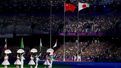 China's and Japan's national flags are seen during the closing ceremony of Hangzhou, Asian Games (REUTERS)