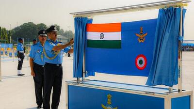 IAF chief Air Chief Marshal Vivek Ram Chaudhari unveiling the new IAF ensign during the Air Force Day parade at Air Force Station-Bamrauli in Prayagraj (Anil Kumar Maurya/HT Photo) IAF chief Air Chief Marshal Vivek Ram Chaudhari unveiling the new IAF ensign during the Air Force Day parade at Air Force Station-Bamrauli in Prayagraj (Anil Kumar Maurya/HT Photo)