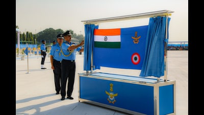 IAF chief Air Chief Marshal Vivek Ram Chaudhari unveiling the new IAF ensign during the Air Force Day parade at Air Force Station-Bamrauli in Prayagraj on Sunday. (Anil Kumar Maurya/HT) IAF chief Air Chief Marshal Vivek Ram Chaudhari unveiling the new IAF ensign during the Air Force Day parade at Air Force Station-Bamrauli in Prayagraj on Sunday. (Anil Kumar Maurya/HT)