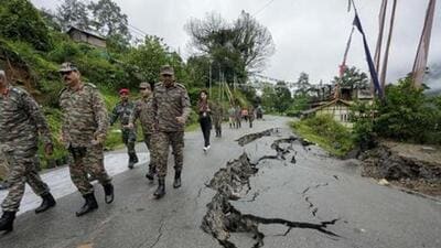 Indian Army officers inspect the damage caused by flash floods in north Sikkim (PTI Photo) Indian Army officers inspect the damage caused by flash floods in north Sikkim (PTI Photo)