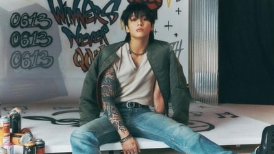 A fan wrote, "Y'all notice the tattoos on JK's hand spray painted behind and under him?" Another commented, "OMG HIS TATTOOS ON THE WALL." An ARMY remarked, "From having to wear gloves to cover his tattoos, to his tattoos being part of the concept of his solo album now. I can't explain how happy that makes me." A fan wrote, "Oh my goodness gracious...how can someone look so cute yet...so tough and hot. Sobs." Another remarked, "Jeon Jungkook, the terror you are." (Instagram) A fan wrote, "Y'all notice the tattoos on JK's hand spray painted behind and under him?" Another commented, "OMG HIS TATTOOS ON THE WALL." An ARMY remarked, "From having to wear gloves to cover his tattoos, to his tattoos being part of the concept of his solo album now. I can't explain how happy that makes me." A fan wrote, "Oh my goodness gracious...how can someone look so cute yet...so tough and hot. Sobs." Another remarked, "Jeon Jungkook, the terror you are." (Instagram)