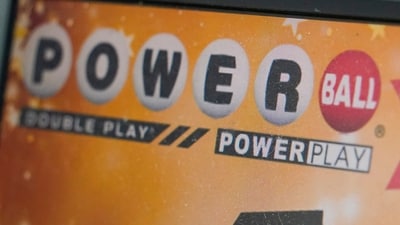 A display panel advertises tickets for a Powerball drawing at a convenience store. (AP) A display panel advertises tickets for a Powerball drawing at a convenience store. (AP)