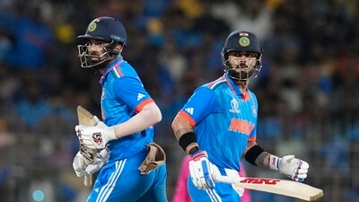Chennai: Indian batters Virat Kohli and KL Rahul run between the wickets during the ICC Men's Cricket World Cup match between India and Australia (PTI)