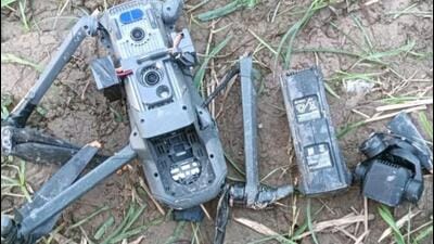 The drone, which is a quadcopter, appeared to have crashed in the field after entering the Indian airspace from Pakistan. (HT Photo)
