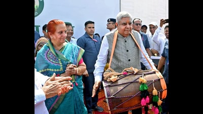 Vice-President Jagdeep Dhankhar plays traditional musical instruments at the Krishi Vikas Mela organised at Chaudhary Charan Singh Haryana Agricultural University in Hisar on Sunday. His wife Sudesh Dhankhar also seen. He urged farmers to secure better prices for their agriculture produce through trading. (ANI) Vice-President Jagdeep Dhankhar plays traditional musical instruments at the Krishi Vikas Mela organised at Chaudhary Charan Singh Haryana Agricultural University in Hisar on Sunday. His wife Sudesh Dhankhar also seen. He urged farmers to secure better prices for their agriculture produce through trading. (ANI)