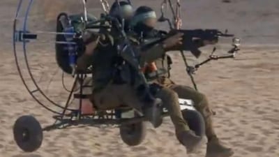 An image of Hamas militants who paraglided into Israel. (@MarioNawfal ) An image of Hamas militants who paraglided into Israel. (@MarioNawfal )