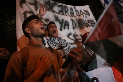 Demonstrators shout slogans during a rally in solidarity with Palestinians in Gaza, in front of the Israeli embassy in Ankara, Turkey. (REUTERS)