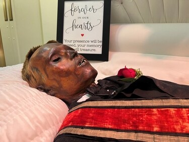 James Murphy, a man who was accidentally mummified and known publicly by the name "Stoneman Willie", lies on display at a local funeral home in Pennsylvania. (Reuters)