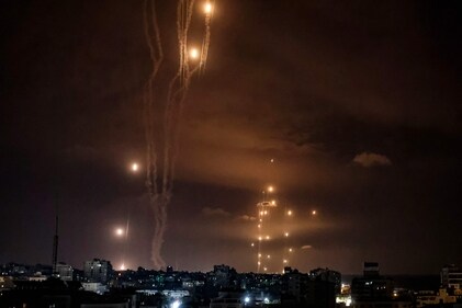 Rockets fired by Palestinian militants from Gaza City are intercepted by the Israeli Iron Dome defence missile system. (AFP) Rockets fired by Palestinian militants from Gaza City are intercepted by the Israeli Iron Dome defence missile system. (AFP)