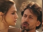 Tiger Shroff, Kriti Sanon and Amitabh Bachchan in stills from Ganapath trailer. Tiger Shroff, Kriti Sanon and Amitabh Bachchan in stills from Ganapath trailer.