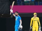 India's KL Rahul raises his bat after scoring the wining run India's KL Rahul raises his bat after scoring the wining run