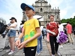 Chinese tourists walk through the historical centre of Macau during the Golden Week holiday. China sees modest domestic trips, less travellers amid Golden Week holiday Chinese tourists walk through the historical centre of Macau during the Golden Week holiday. China sees modest domestic trips, less travellers amid Golden Week holiday