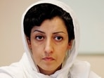 FILE -  Iranian Narges Mohammadi, delegate of the Center for Human Rights Defenders, listens to a question during a press conference on the Assessment of the Human Rights Situation in Iran, at the U.N. headquarters in Geneva, Switzerland, on June 9, 2008. The Nobel Peace Prize has been awarded to Narges Mohammadi for fighting oppression of women in Iran. The chair of the Norwegian Nobel Committee announced the prize Friday, Oct. 6, 2023 in Oslo. (Magali Girardin/Keystone via AP, File)