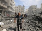Israel-Palestine War: Palestinians evacuate the area following an Israeli airstrike in Gaza City. Israel-Palestine War: Palestinians evacuate the area following an Israeli airstrike in Gaza City.